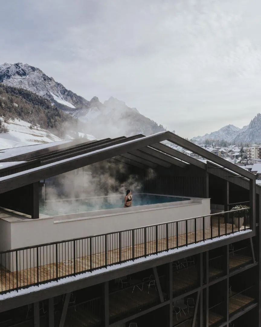 Steam rising from the rooftop pool at AMA Stay on a winter day