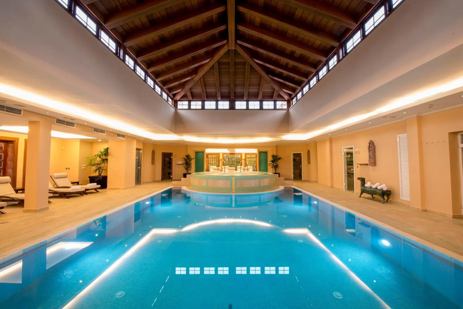 Indoor spa pool under a timber ceiling