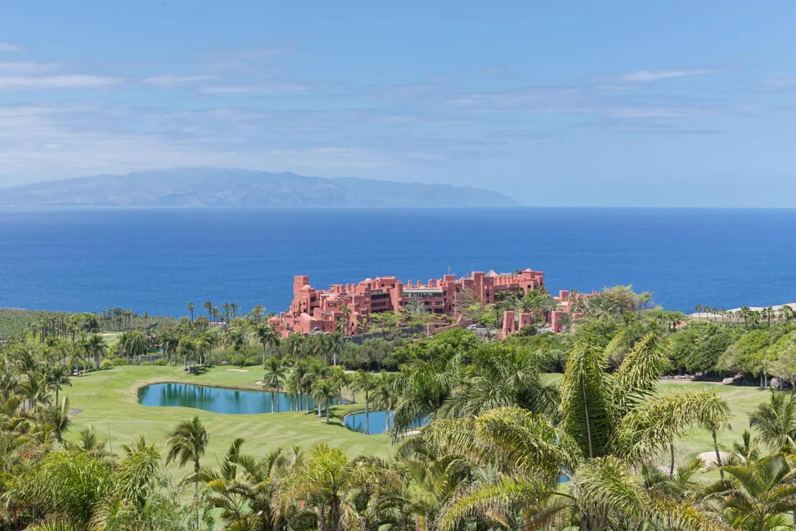 Golf course and resort buildings on the clifftop, sea and La Gomera behind