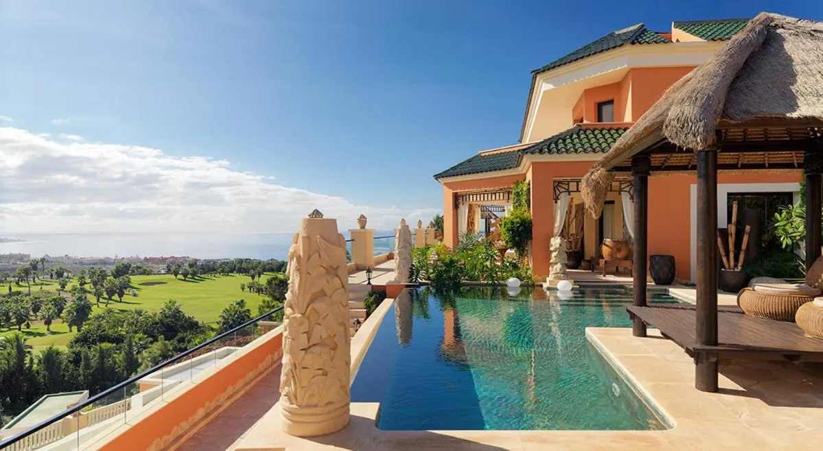 Private heated infinity pool on a villa terrace above the Costa Adeje golf course at Royal Garden Villas